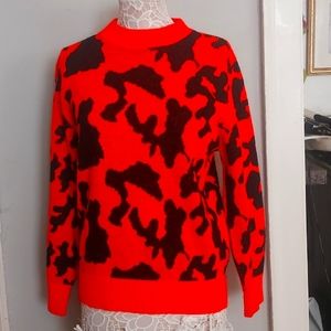 Neon orange and black camo sweater